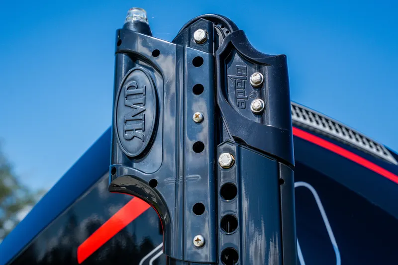 Slide: The Image of Close-up of 2008 Lake & Bay Boca Grande 20 boat component against blue sky. - 74