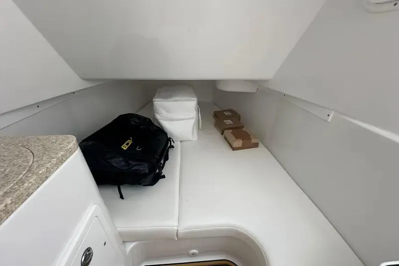 Slide: The Image of Interior cabin of 2025 HCB 39 Speciale boat with storage items. - 19