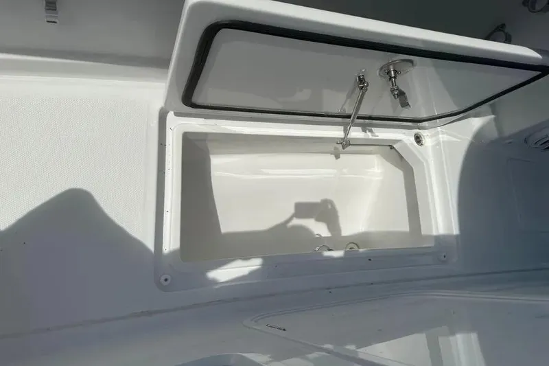 Slide: The Image of Open storage compartment on 2025 HCB 39 Speciale boat, featuring sleek design and functionality. - 32