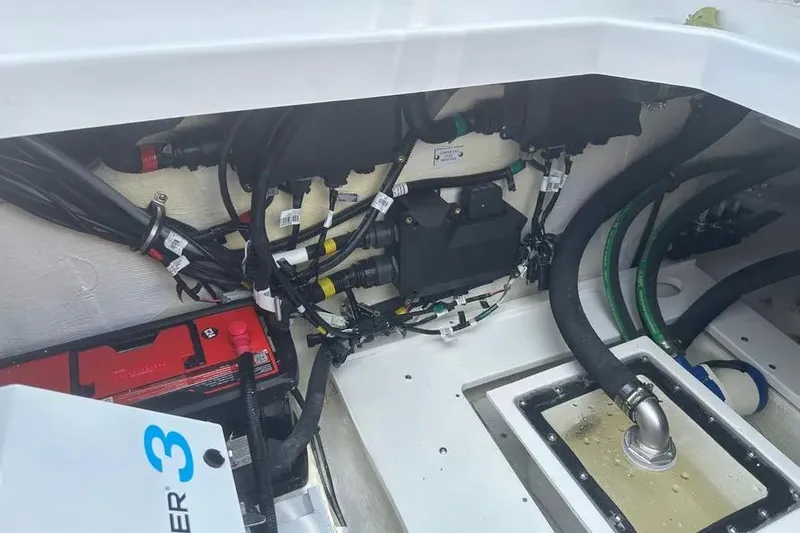 Slide: The Image of Engine compartment of 2025 HCB 39 Speciale, showcasing wiring and components. - 33