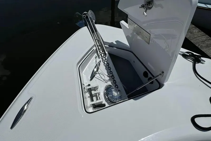 Slide: The Image of 2025 HCB 39 Speciale boat anchor compartment with chain and winch system. - 5