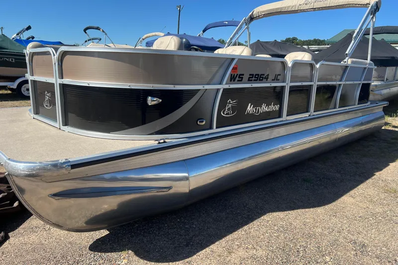 The Image of 2014 Misty Harbor 2285 Biscayne Bay CU pontoon boat on display outdoors. - 0