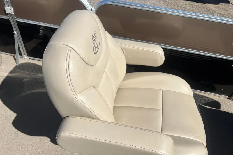 Slide: The Image of Beige captain's chair on 2014 Misty Harbor 2285 Biscayne Bay CU pontoon boat. - 21