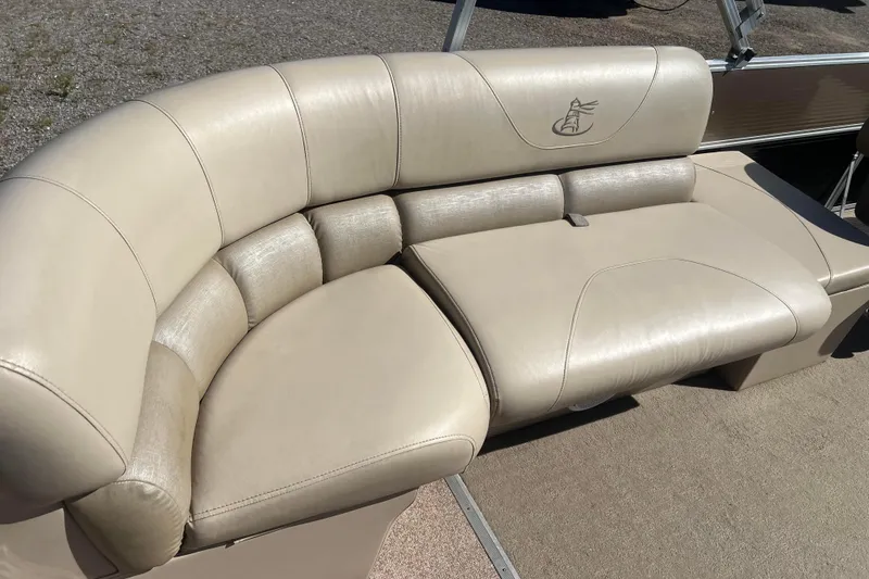 Slide: The Image of 2014 Misty Harbor 2285 Biscayne Bay CU boat seating, beige leather upholstery. - 23