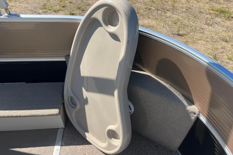 Slide: The Image of 2014 Misty Harbor 2285 Biscayne Bay CU boat interior with removable table. - 26