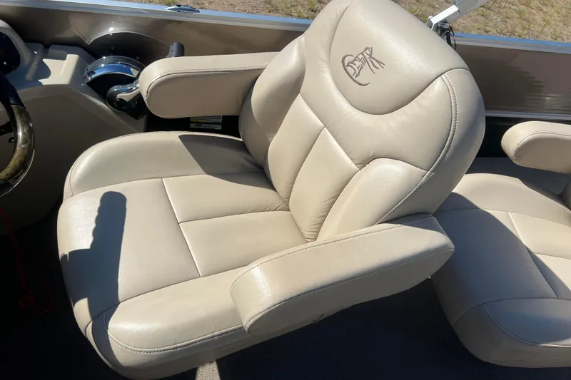 Slide: The Image of 2014 Misty Harbor 2285 Biscayne Bay CU boat seat, beige leather upholstery. - 29