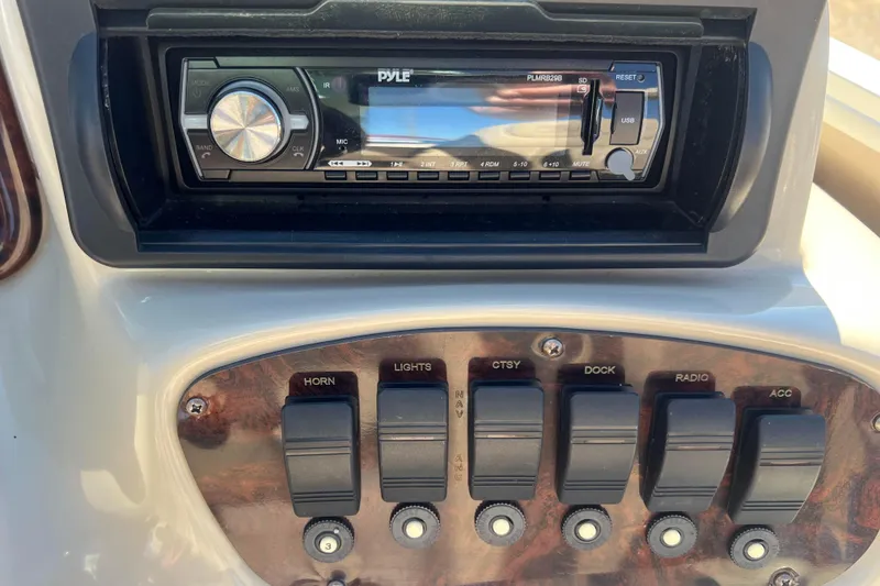 Slide: The Image of Control panel of a 2014 Misty Harbor 2285 Biscayne Bay CU with Pyle stereo system. - 32