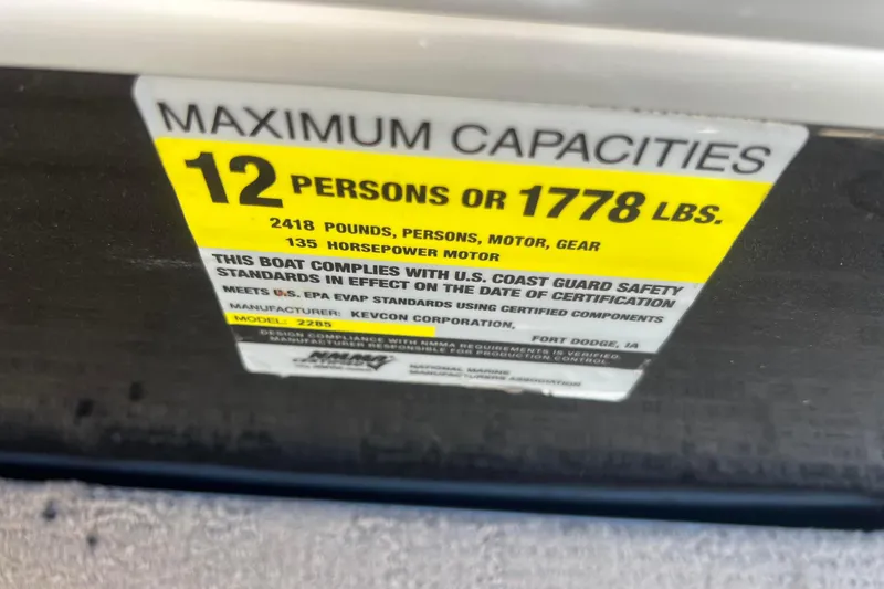 Slide: The Image of Capacity label on 2014 Misty Harbor 2285 Biscayne Bay CU boat, 12 persons or 1778 lbs. - 33