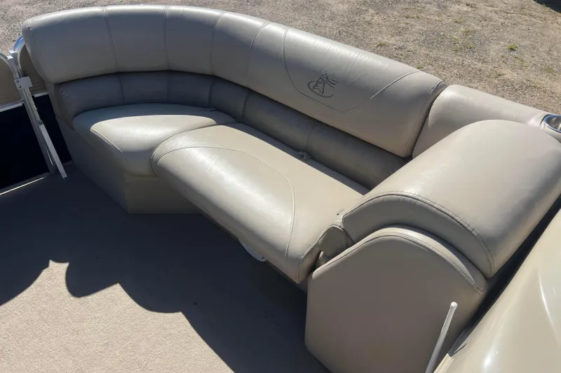 Slide: The Image of 2014 Misty Harbor 2285 Biscayne Bay CU boat seating, beige leather upholstery. - 38