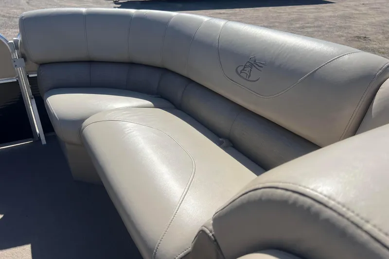 Slide: The Image of 2014 Misty Harbor 2285 Biscayne Bay CU boat seating, beige leather upholstery. - 40
