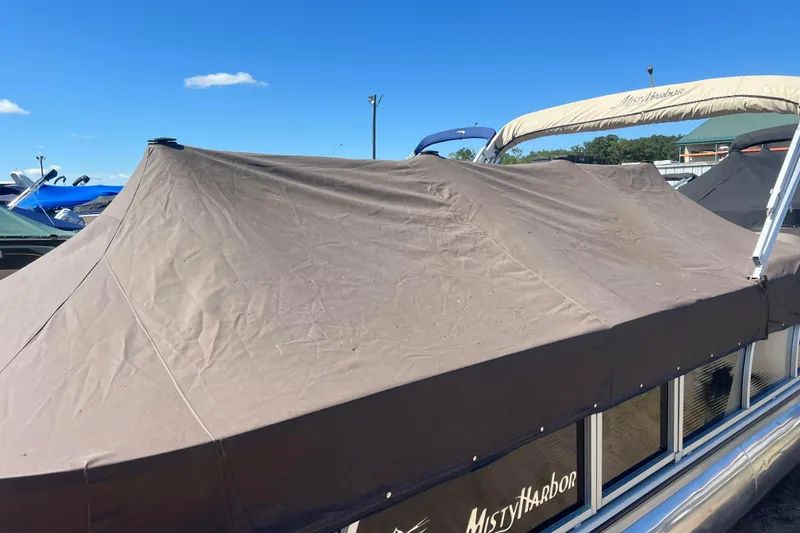 Slide: The Image of 2014 Misty Harbor 2285 Biscayne Bay CU pontoon boat with brown cover. - 43