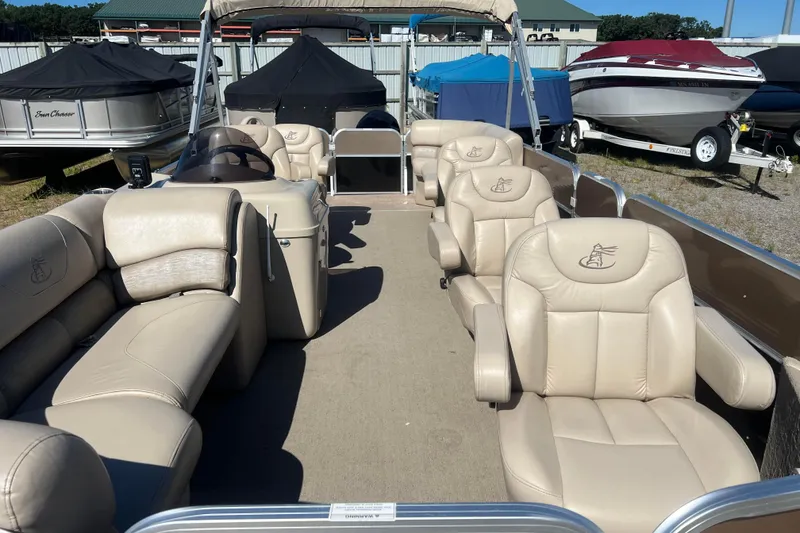 Slide: The Image of 2014 Misty Harbor 2285 Biscayne Bay CU pontoon boat with beige seating and spacious interior. - 7