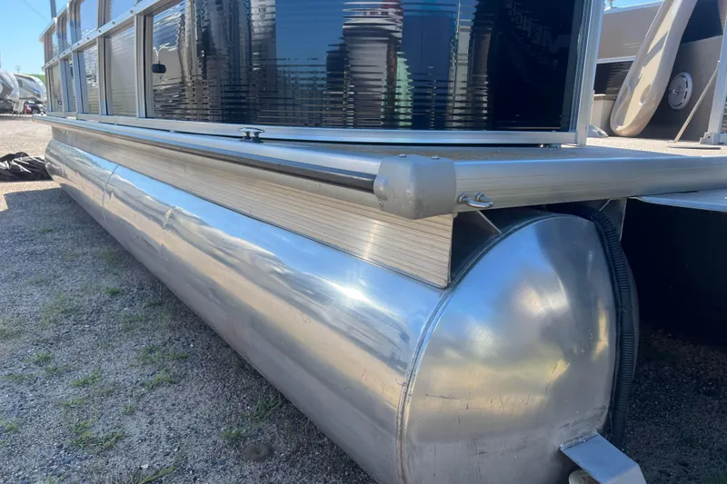 Slide: The Image of 2014 Misty Harbor 2285 Biscayne Bay CU pontoon boat on gravel surface. - 9