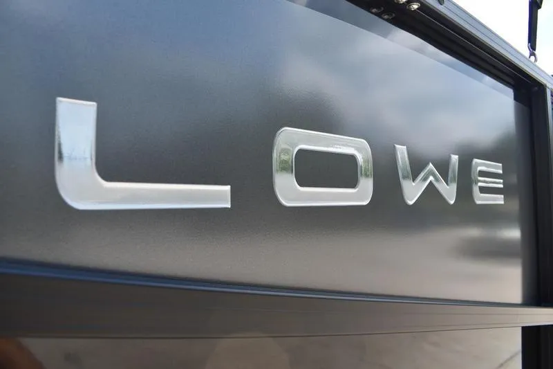 Slide: The Image of 2026 Lowe LS 170 boat interior with gray seating and flooring. - 12