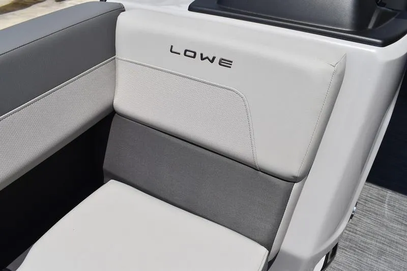 Slide: The Image of 2026 Lowe LS 170 boat interior with sleek gray seating and modern design. - 14