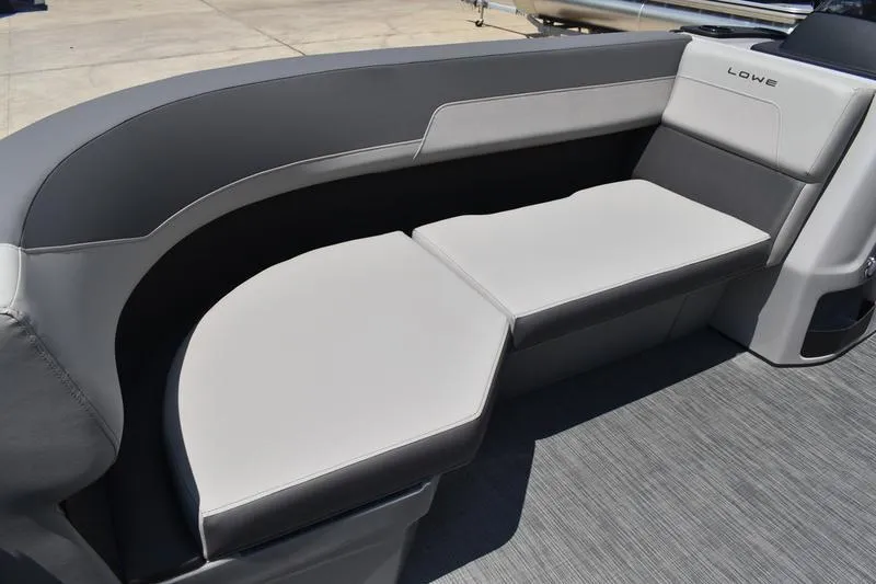 Slide: The Image of 2026 Lowe LS 170 boat interior with sleek, modern seating design. - 18