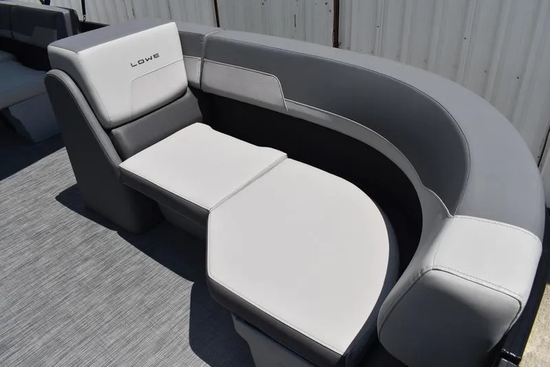 Slide: The Image of 2026 Lowe LS 170 boat seating with gray and white upholstery. - 20