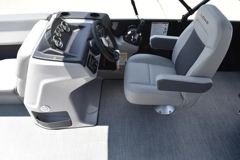 Slide: The Image of Luxurious seating on 2026 Lowe LS 170 boat, featuring sleek gray upholstery. - 26