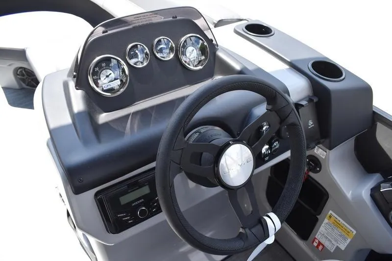 Slide: The Image of 2026 Lowe LS 170 boat interior with gray seating and spacious layout. - 28