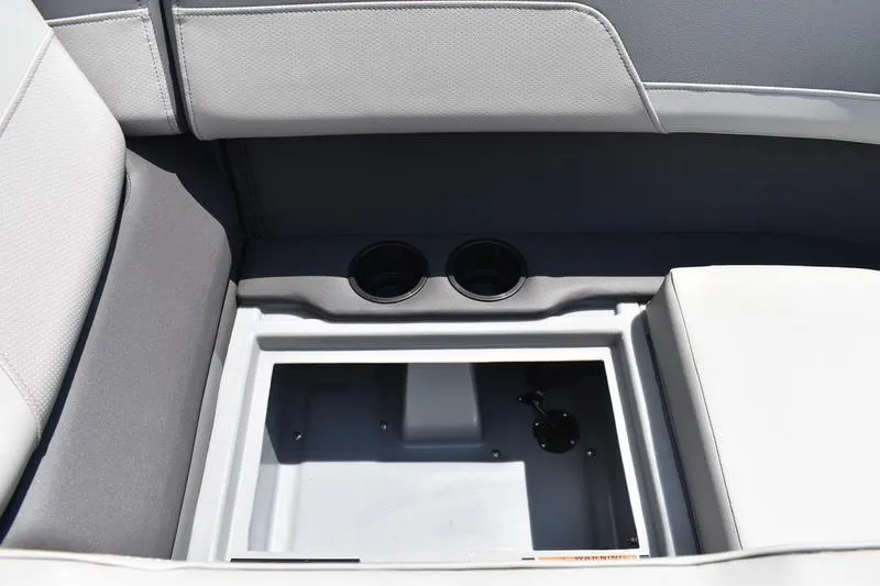 Slide: The Image of 2026 Lowe LS 170 boat interior with steering console and captain's chair. - 29