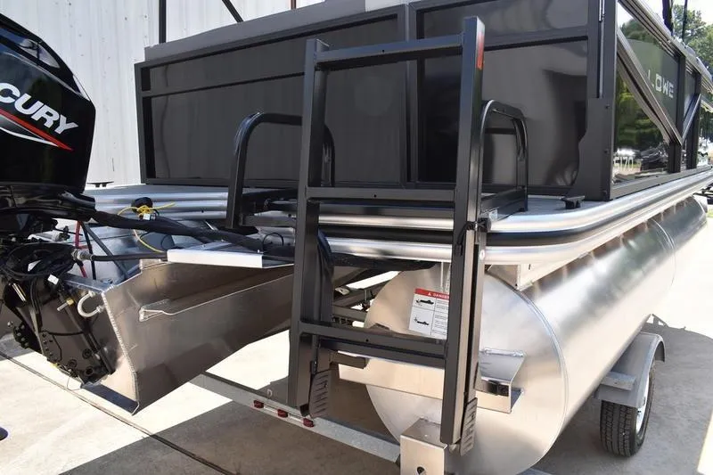 Slide: The Image of Close-up of Lowe LS 170 logo on a sleek, modern surface, 2026 model. - 3