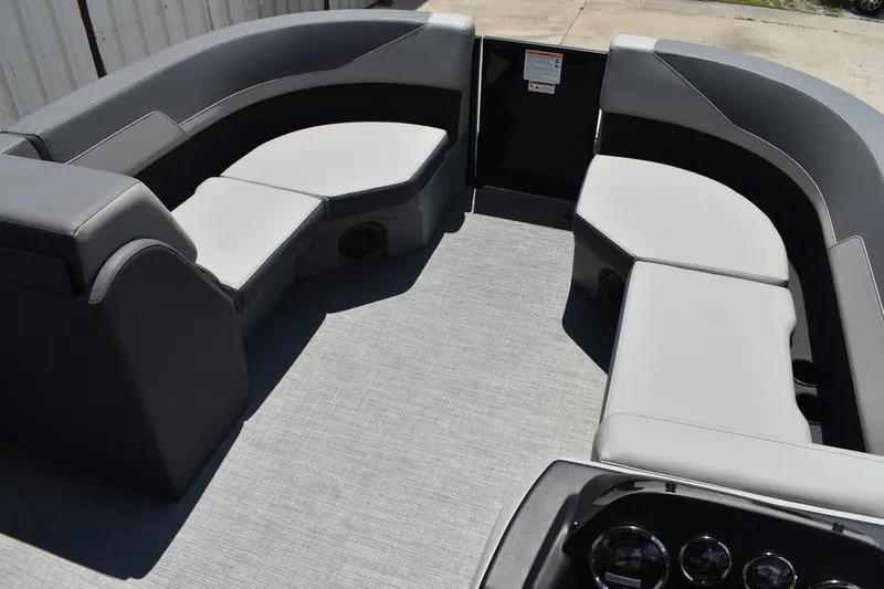 Slide: The Image of Steering console of 2026 Lowe LS 170 boat with gauges and controls. - 32