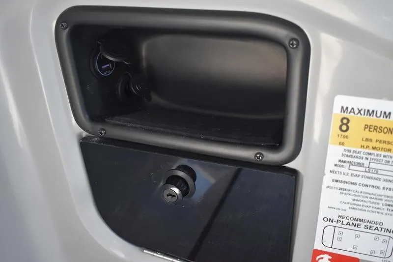 Slide: The Image of 2026 Lowe LS 170 boat interior with gray cushioned seating and modern design. - 38