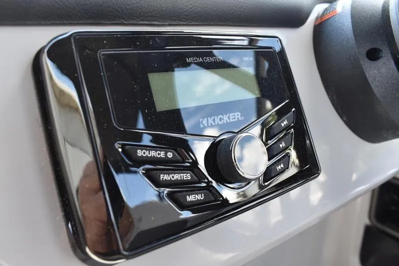 Slide: The Image of 2026 Lowe LS 170 boat seat with integrated cup holders, featuring sleek gray and white upholstery. - 41