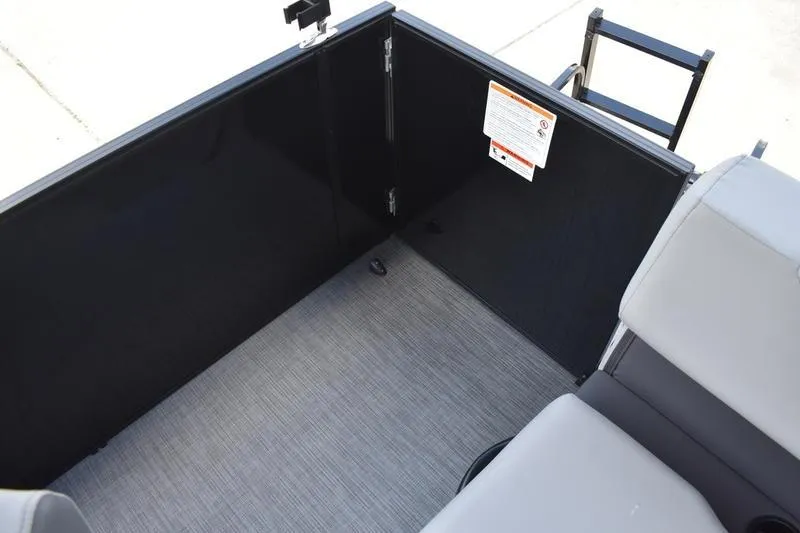 Slide: The Image of Interior view of 2026 Lowe LS 170 boat with seating and storage area. - 43