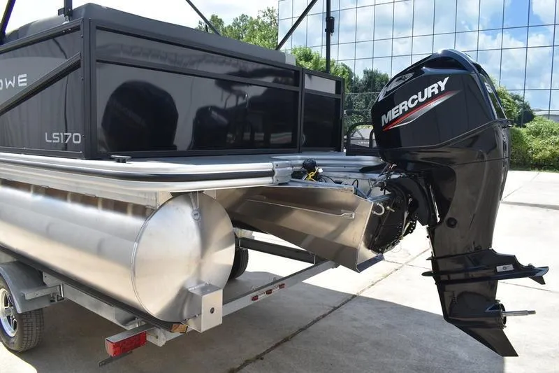 Slide: The Image of 2026 Lowe LS 170 pontoon boat rear view with Mercury outboard motor and ladder. - 5