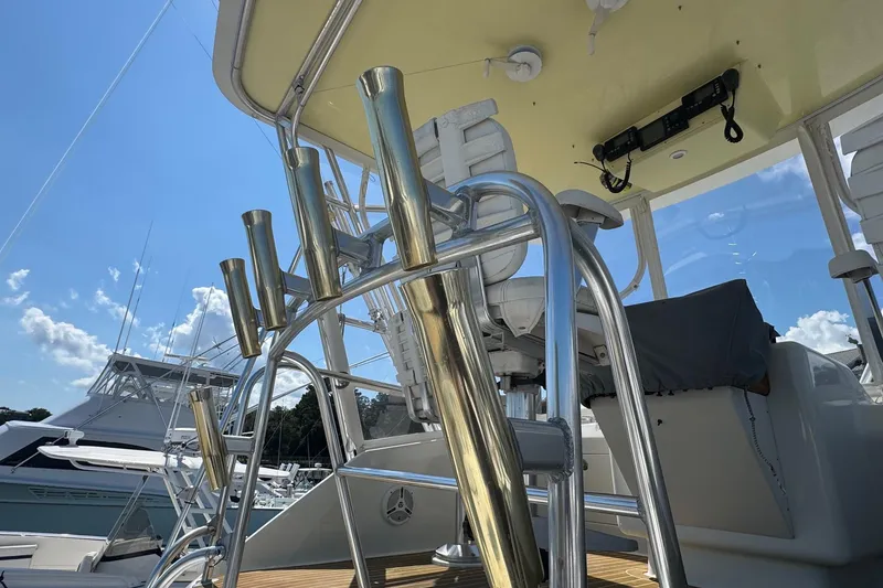 Slide: The Image of 1975 Chris Craft 30 Tournament SF boat with polished metal railings and seating. - 11