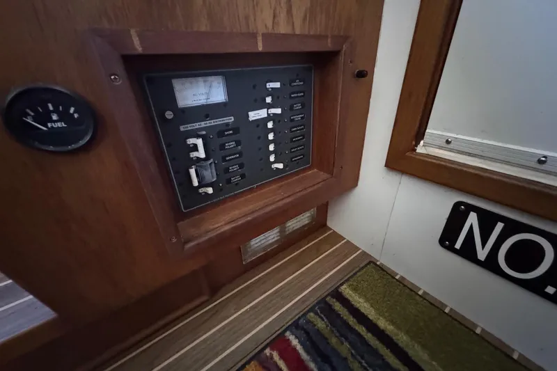 Slide: The Image of Control panel of a 1975 Chris Craft 30 Tournament SF boat interior. - 29
