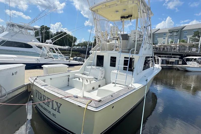 Slide: The Image of 1975 Chris Craft 30 Tournament SF boat docked in marina, sunny day. - 4