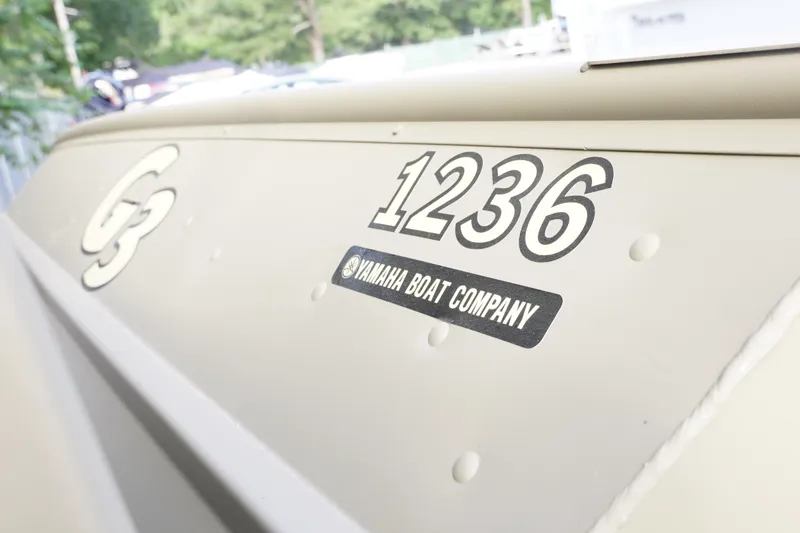 Slide: The Image of 2026 G3 Gator Tough 1236 boat by Yamaha Boat Company, side view. - 7