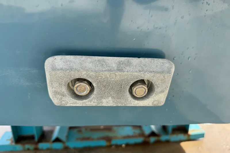 Slide: The Image of Close-up of a 2023 Front Runner 33 CC boat component with bolts. - 11