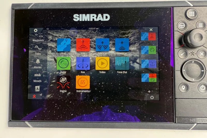 Slide: The Image of Simrad navigation display on 2023 Front Runner 33 CC boat, showing various marine functions. - 29