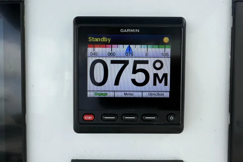 Slide: The Image of Garmin display on 2023 Front Runner 33 CC boat showing 075° heading. - 30
