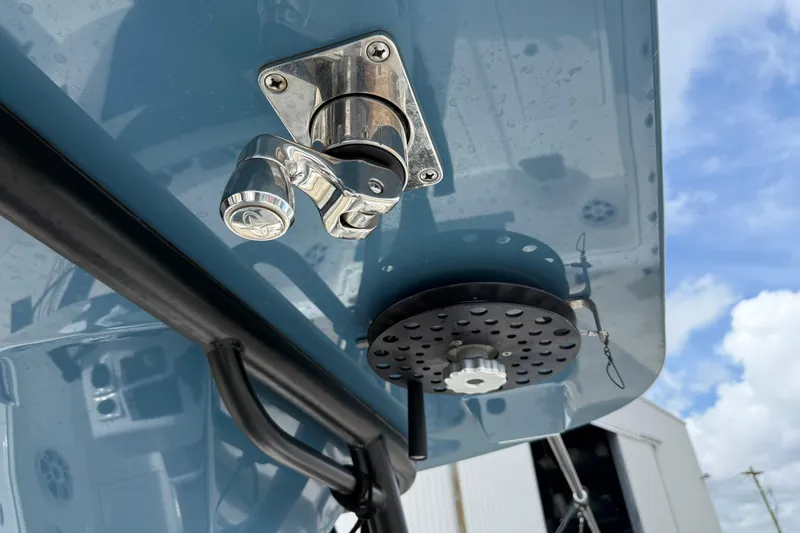 Slide: The Image of Close-up of 2023 Front Runner 33 CC boat hardware against a blue sky background. - 37