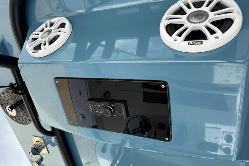 Slide: The Image of 2023 Front Runner 33 CC boat audio system with Fusion speakers and control panel. - 39