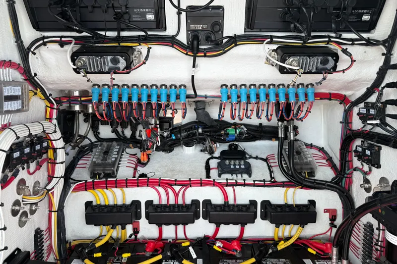 Slide: The Image of Electrical wiring system in 2023 Front Runner 33 CC boat, showcasing organized cables and components. - 51