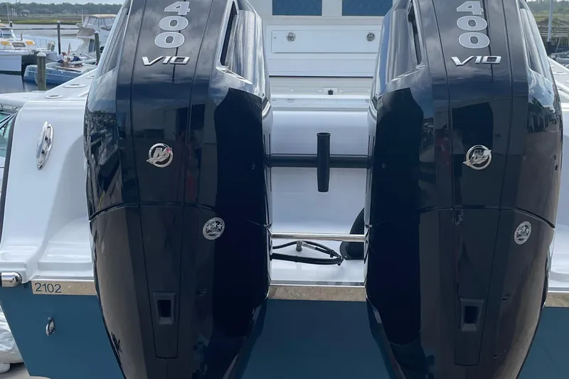 Slide: The Image of Twin 400 V10 engines on a 2023 Front Runner 33 CC boat. - 9