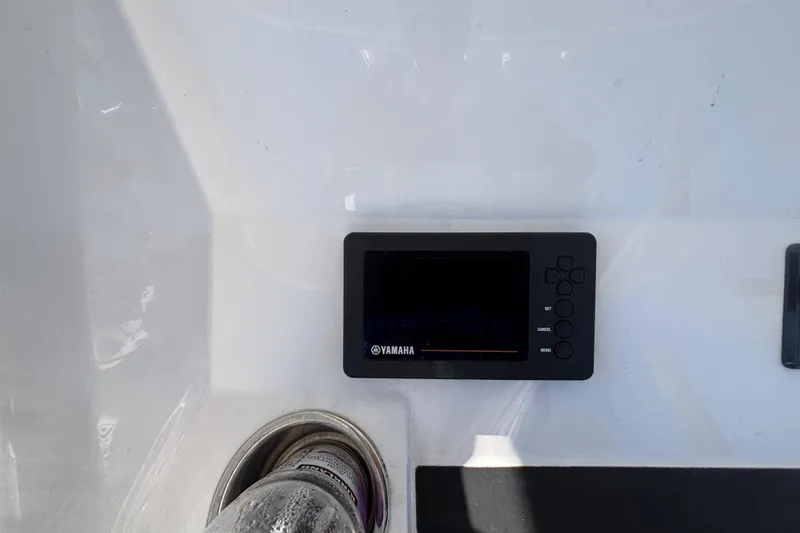 Slide: The Image of Yamaha display panel on 2017 Regulator 28 boat dashboard. - 22