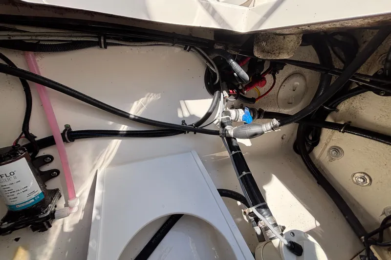 Slide: The Image of 2017 Regulator 28 boat interior wiring and plumbing system. - 54