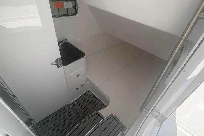 Slide: The Image of Interior cabin of 2025 HCB 39 Speciale boat, featuring a compact sink and modern design. - 19