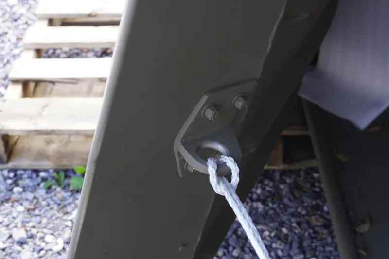 Slide: The Image of Close-up of a 2026 G3 Gator Tough 1436 boat with a rope tied to a metal cleat. - 10