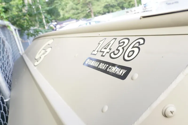 Slide: The Image of 2026 G3 Gator Tough 1436 boat with Yamaha branding, parked outdoors. - 13