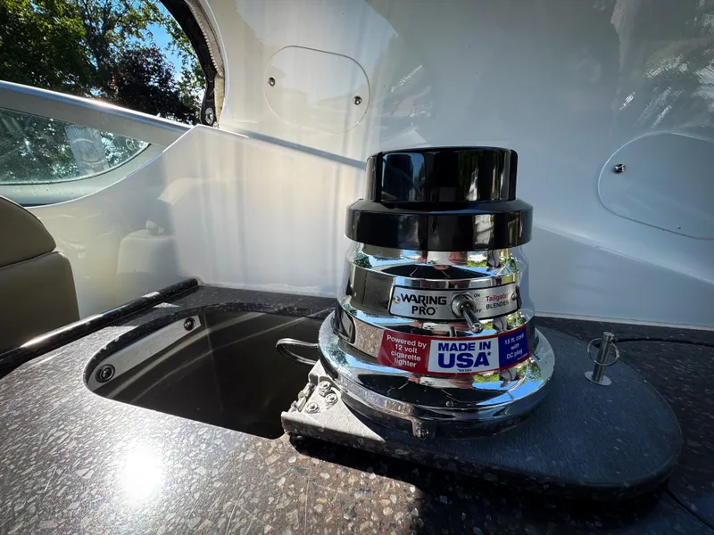 Slide: The Image of Waring Pro blender on 2016 Rinker 290 Express boat, featuring "Made in USA" label. - 30