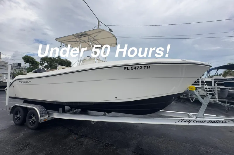 The Image of 2022 Cobia 237 Center Console boat on trailer, under 50 hours usage. - 0