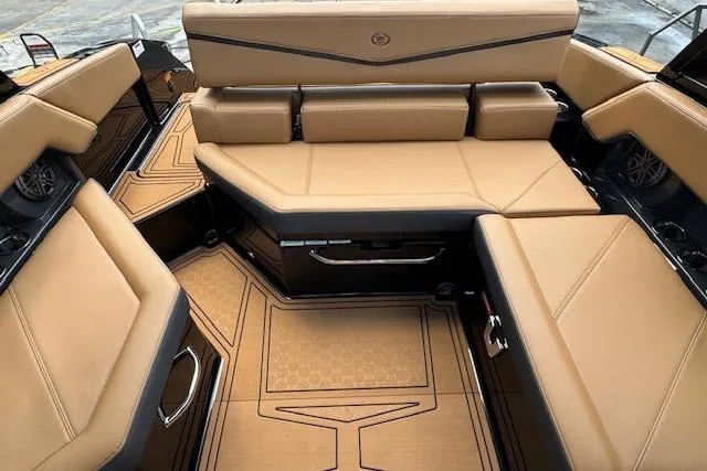 Slide: The Image of Luxurious interior of 2026 Cobalt R4 Surf boat with tan leather seating. - 16
