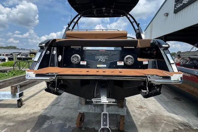 Slide: The Image of 2026 Cobalt R4 Surf boat rear view with speakers and swim platform. - 9